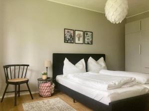 A bed or beds in a room at Gartenhaus5