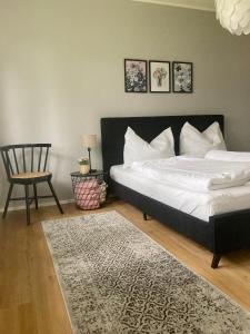 A bed or beds in a room at Gartenhaus5