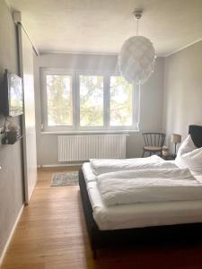A bed or beds in a room at Gartenhaus5