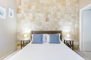 Postel nebo postele na pokoji v ubytování Torrelama Room & Breakfast
