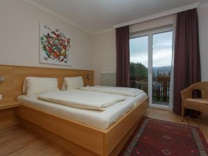 Posteľ alebo postele v izbe v ubytovaní Apartment Sonnenblume by Interhome