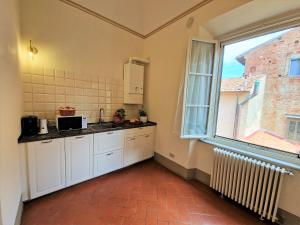 Kuchyň nebo kuchyňský kout v ubytování Palazzo Rosselmini