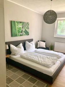 A bed or beds in a room at Gartenhaus5