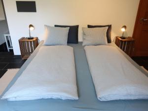 Posteľ alebo postele v izbe v ubytovaní Apartment Grangettes by Interhome