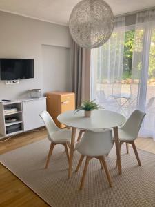 A television and/or entertainment centre at Gartenhaus5