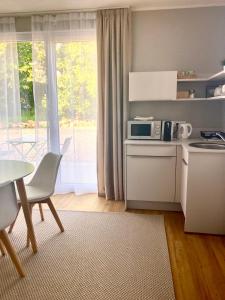 A kitchen or kitchenette at Gartenhaus5