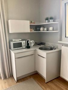 A kitchen or kitchenette at Gartenhaus5