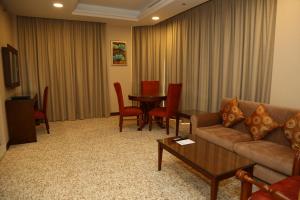 Телевизор и/или развлекательный центр в Grand Legacy Hotel Doha
