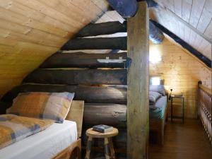 Voodi või voodid majutusasutuse Chalet Sosto by Interhome toas