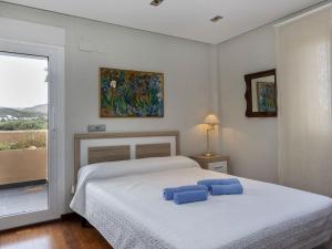 Postel nebo postele na pokoji v ubytování Villa Finca Villa Roig by Interhome