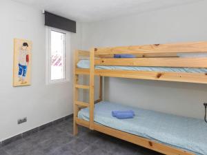 Postel nebo postele na pokoji v ubytování Villa Finca Villa Roig by Interhome