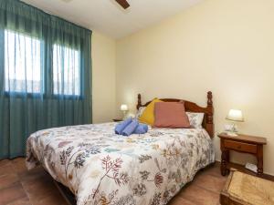 Postel nebo postele na pokoji v ubytování Holiday Home Ca La Lou by Interhome