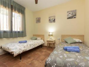 Postel nebo postele na pokoji v ubytování Holiday Home Ca La Lou by Interhome