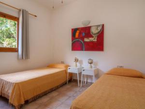 Posteľ alebo postele v izbe v ubytovaní Holiday Home Es Pujols by Interhome