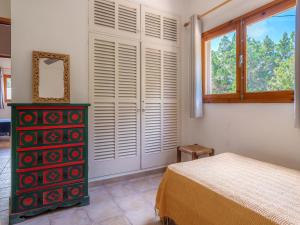 Posteľ alebo postele v izbe v ubytovaní Holiday Home Es Pujols by Interhome