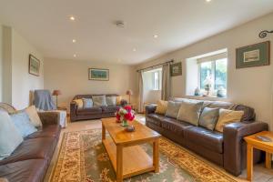 Posezení v ubytování Bill's Cottage + 16 fotografií