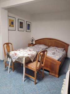 Łóżko lub łóżka w pokoju w obiekcie Penzion Duong Apartments