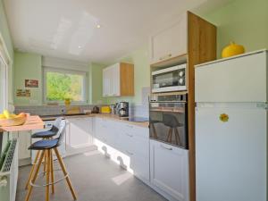 A kitchen or kitchenette at Holiday Home Ker Yannick by Interhome