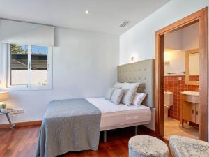 Posteľ alebo postele v izbe v ubytovaní Holiday Home Villa Marina by Interhome