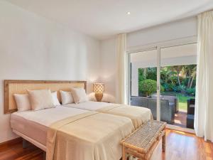 Posteľ alebo postele v izbe v ubytovaní Holiday Home Villa Marina by Interhome