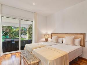 Posteľ alebo postele v izbe v ubytovaní Holiday Home Villa Marina by Interhome
