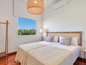 Posteľ alebo postele v izbe v ubytovaní Holiday Home Villa Marina by Interhome