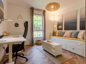 Μια τηλεόραση ή/και κέντρο ψυχαγωγίας στο Apartment Nouvelle Vague-2 by Interhome