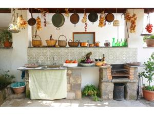 een keuken met een aanrecht met potten en pannen bij Apartment Casa Dolce Casa-2 by Interhome in Massa Lubrense