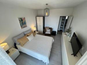 Postel nebo postele na pokoji v ubytování Apartments Kale Center