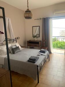 Postel nebo postele na pokoji v ubytování Kokkala Guestrooms