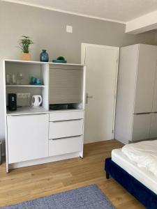 A kitchen or kitchenette at Gartenhaus5