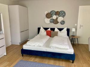 A bed or beds in a room at Gartenhaus5