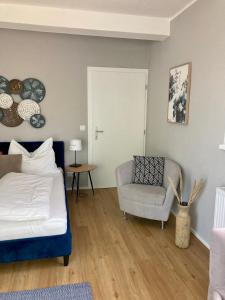 A bed or beds in a room at Gartenhaus5