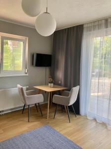 A television and/or entertainment centre at Gartenhaus5