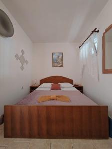 Postel nebo postele na pokoji v ubytování Apartments Turan Centrally Located with Free Parking