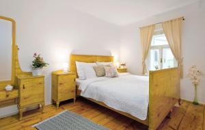 Posteľ alebo postele v izbe v ubytovaní Apartmány U rybníčku