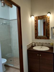 Ванная комната в Casa Santa Teresita
