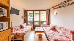 TV a/nebo společenská místnost v ubytování Grand Morillon 116 - Appt pied des pistes - 5 pers