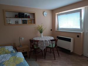 Postel nebo postele na pokoji v ubytování Apartmán Store