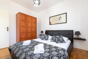 Posteľ alebo postele v izbe v ubytovaní Apartments Triporte
