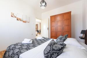 Posteľ alebo postele v izbe v ubytovaní Apartments Triporte