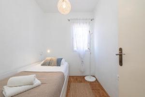 Posteľ alebo postele v izbe v ubytovaní Apartments Triporte