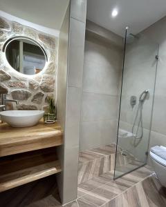 Ett badrum på Aleria Central Apartments