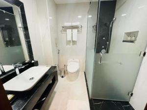 Ванная комната в Grand Legacy Hotel Doha