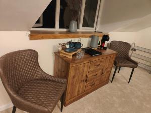 Ein Sitzbereich in der Unterkunft Ystafell Gelert Room
