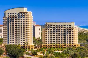 a view of two tall buildings in a city at Luau 7012 in Destin