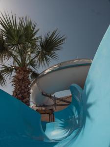 Bazén v ubytování Camping Le Calypso 5 étoiles nebo v jeho okolí