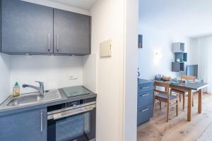 Kuchyň nebo kuchyňský kout v ubytování Backauf