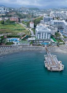 an aerial view of a beach with boats in the water at ARIA RESORT & SPA HOTEL Ultra All Inclusive in Konaklı