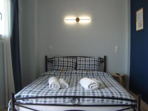 A bed or beds in a room at Dream House Ioannina